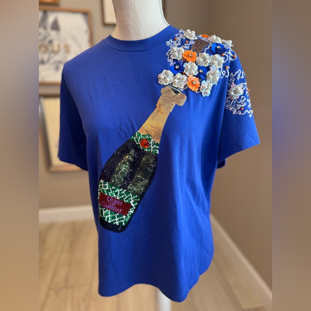 New! QUEEN OF SPARKLES Blue and Orange Sequin Popping Champagne Bottles Tee
